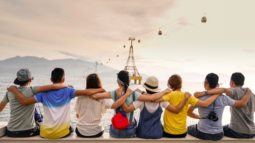 friends putting hands on each others' shoulders